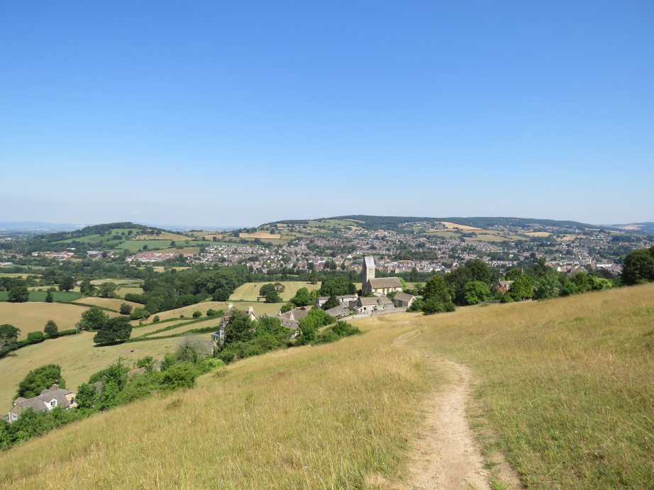 The Cotswold Way across Selsley Common,
    with All Saints Church and Frome Valley in the background